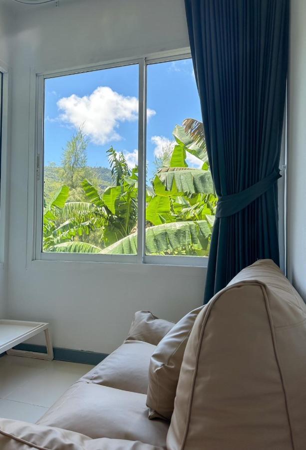 Baobab Hotel Patong Bagian luar foto